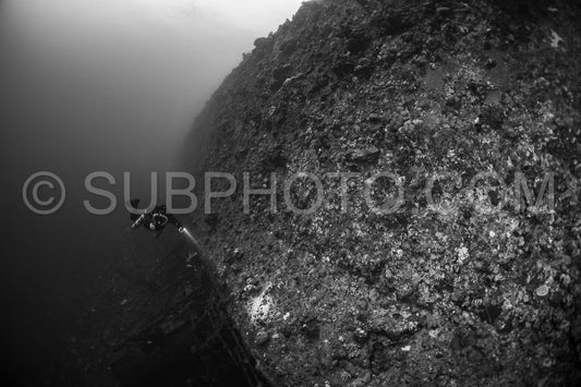 Tek diver with a rebreather visiting Levanzo wreck close to Sudan