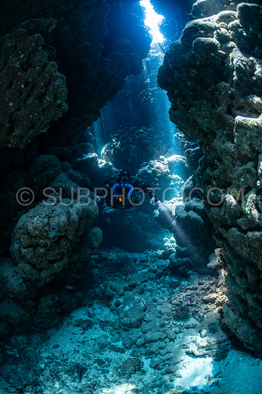 Tek diver with a rebreather visiting Gota Jeny's cave Red Sea Egypt