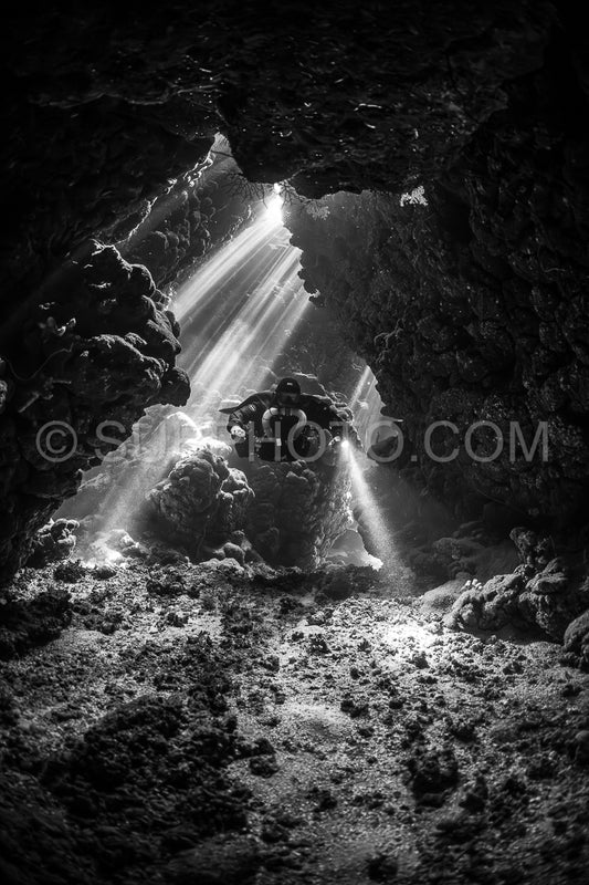 Tek diver with a rebreather visiting Gota Jeny's cave Red Sea Egypt