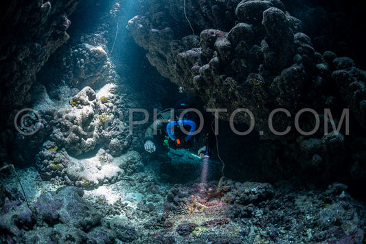 Tek diver with a rebreather visiting Gota Jeny's cave Red Sea Egypt