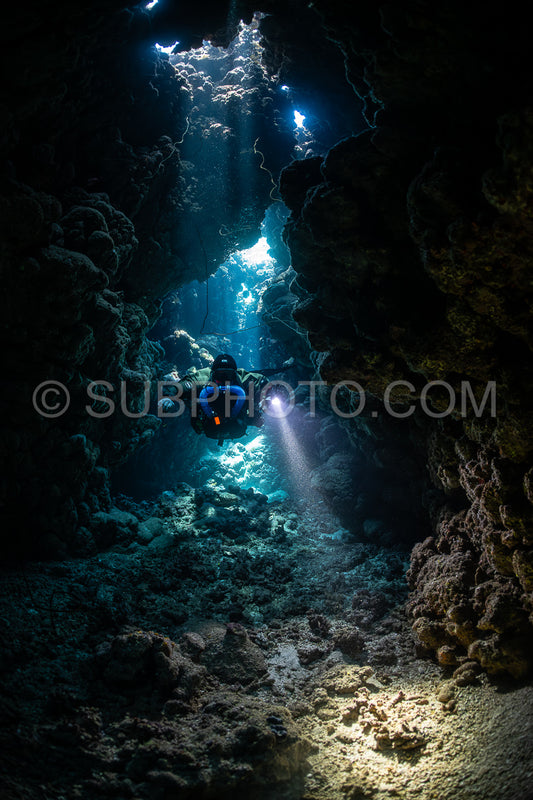 Tek diver with a rebreather visiting Gota Jeny's cave Red Sea Egypt