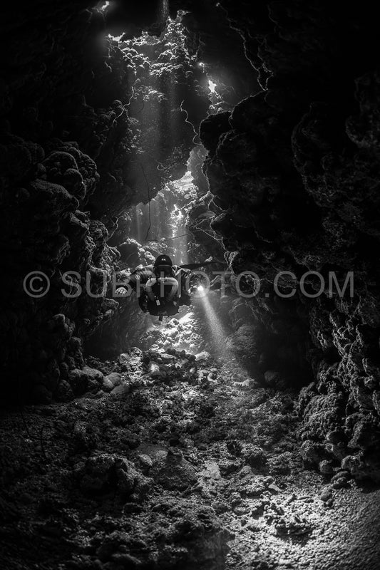 Tek diver with a rebreather visiting Gota Jeny's cave Red Sea Egypt