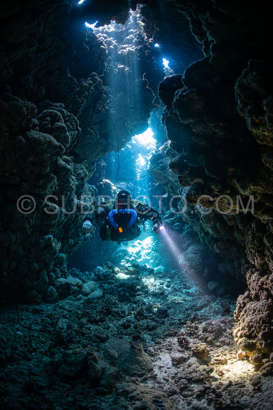 Tek diver with a rebreather visiting Gota Jeny's cave Red Sea Egypt