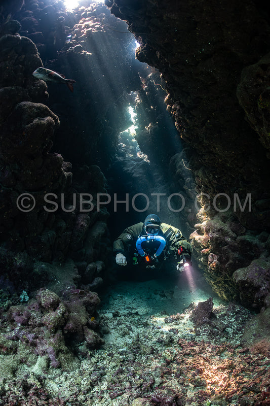 Tek diver with a rebreather visiting Gota Jeny's cave Red Sea Egypt