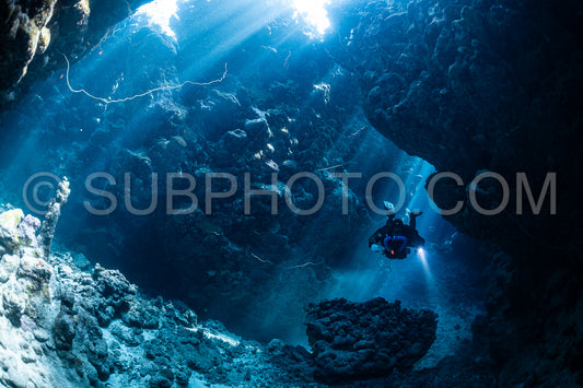 Tek diver with a rebreather visiting Gota Jeny's cave Red Sea Egypt