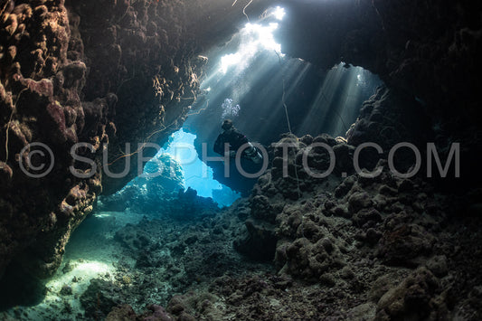 Tek diver with a rebreather visiting Gota Jeny's cave Red Sea Egypt