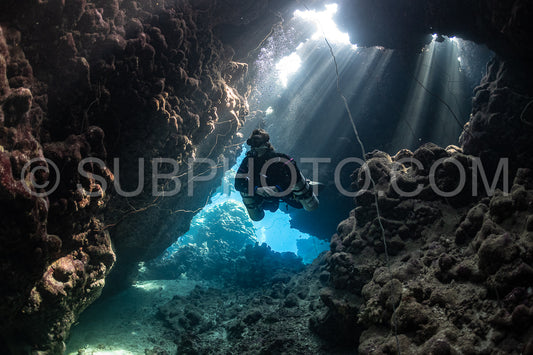 Tek diver with a rebreather visiting Gota Jeny's cave Red Sea Egypt