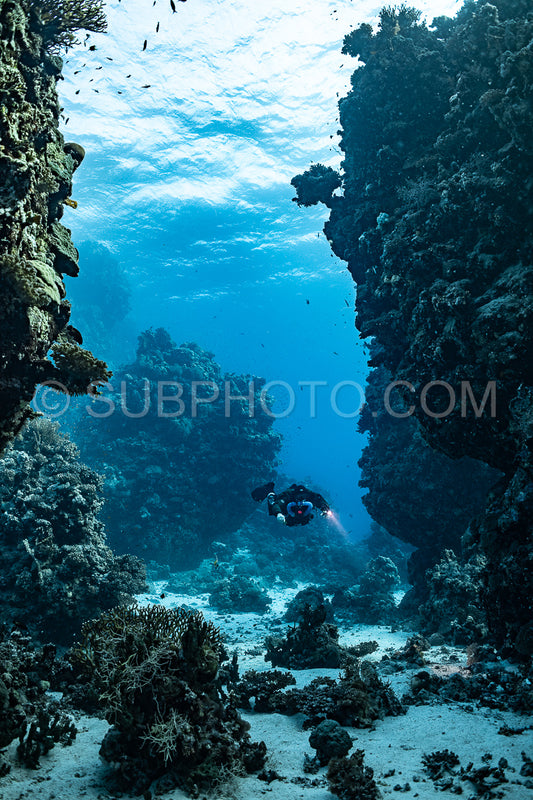 Tek diver using a rebreather discovering the majesty of coral structures in the Red Sea