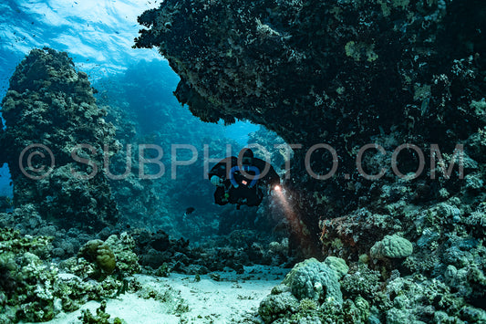 Tek diver using a rebreather discovering the majesty of coral structures in the Red Sea