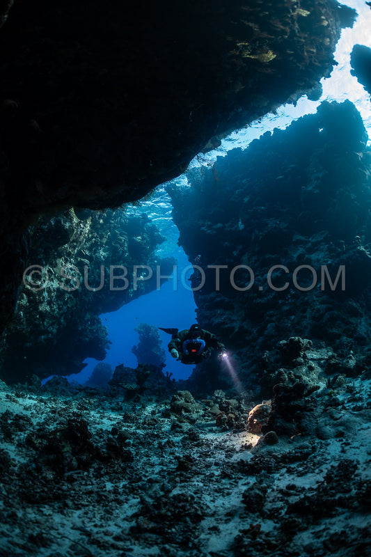 Tek diver with a rebreather visiting Saint John's cave Red Sea Egypt