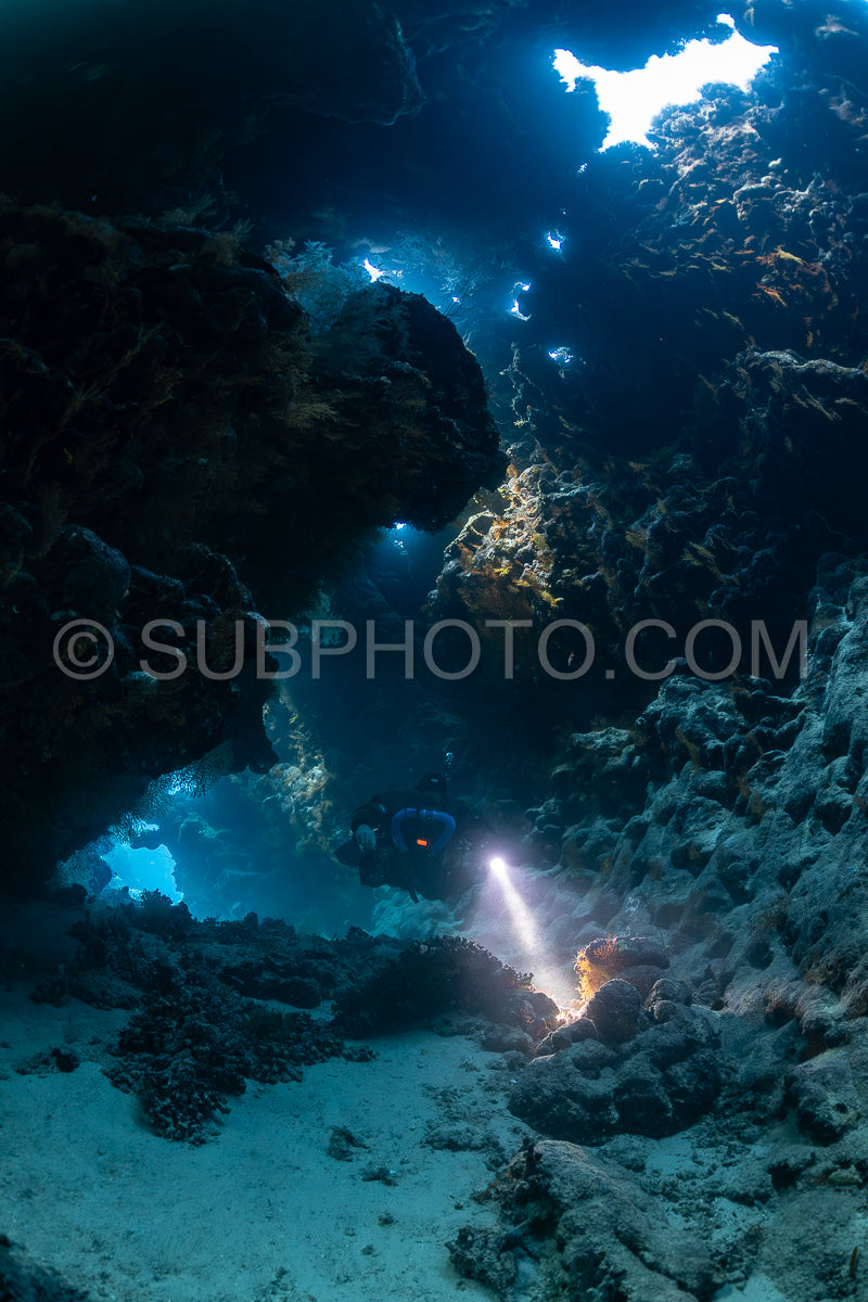 Tek diver with a rebreather visiting Saint John's cave Red Sea Egypt