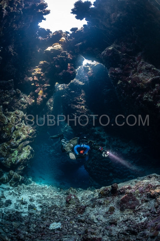 Tek diver with a rebreather visiting Saint John's cave Red Sea Egypt