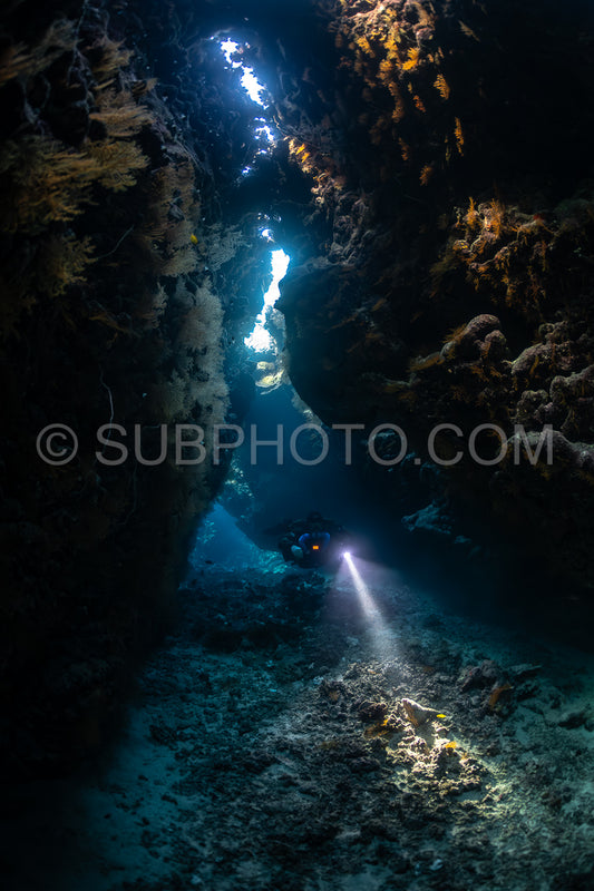 Tek diver with a rebreather visiting Saint John's cave Red Sea Egypt