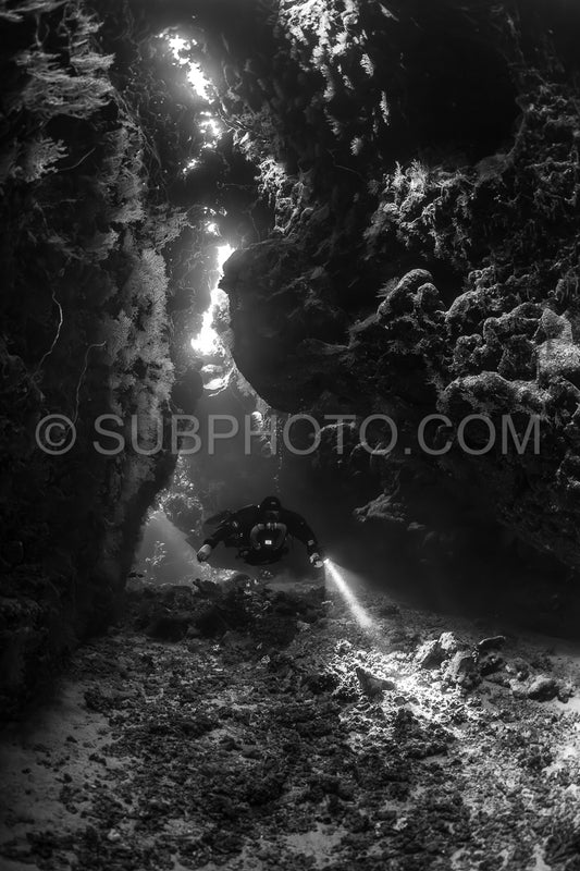 Tek diver with a rebreather visiting Saint John's cave Red Sea Egypt