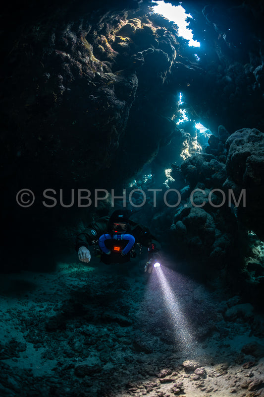 Tek diver with a rebreather visiting Saint John's cave Red Sea Egypt