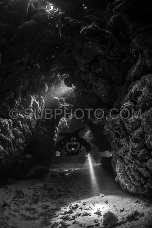 Tek diver with a rebreather visiting Saint John's cave Red Sea Egypt