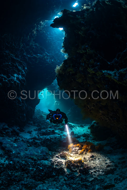 Tek diver with a rebreather visiting Saint John's cave Red Sea Egypt