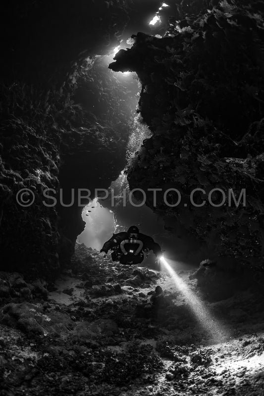 Tek diver with a rebreather visiting Saint John's cave Red Sea Egypt