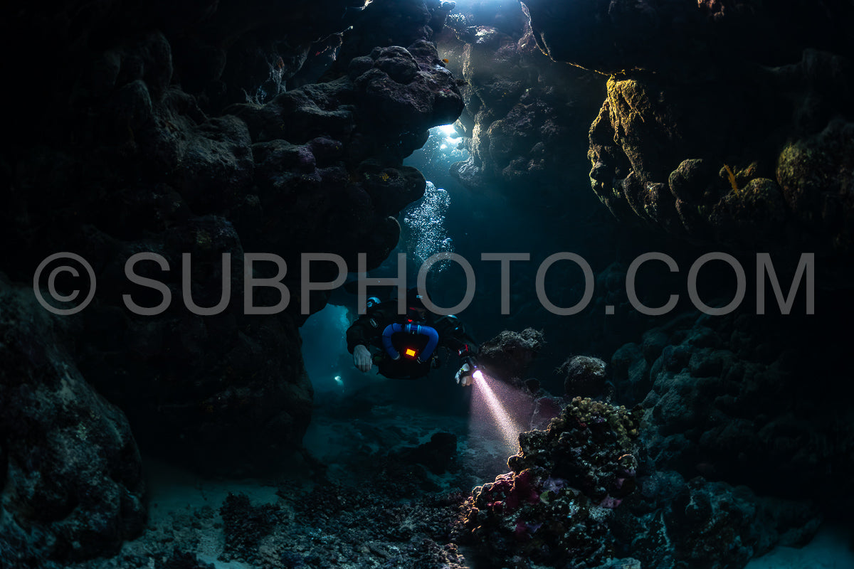 Tek diver with a rebreather visiting Saint John's cave Red Sea Egypt