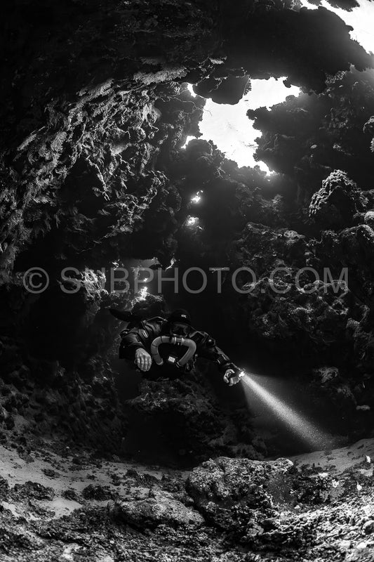 Tek diver with a rebreather visiting Saint John's cave Red Sea Egypt