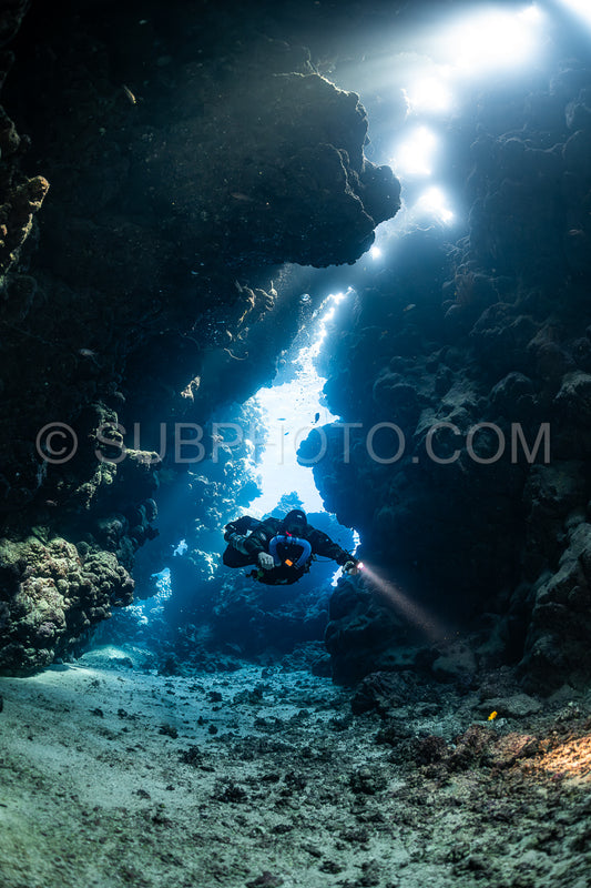 Tek diver with a rebreather visiting Sha'ab Claudio cave Red Sea Egypt