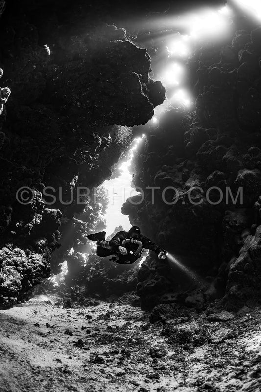 Tek diver with a rebreather visiting Sha'ab Claudio cave Red Sea Egypt