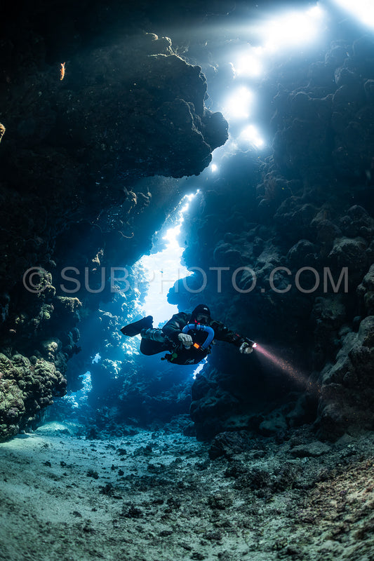 Tek diver with a rebreather visiting Sha'ab Claudio cave Red Sea Egypt