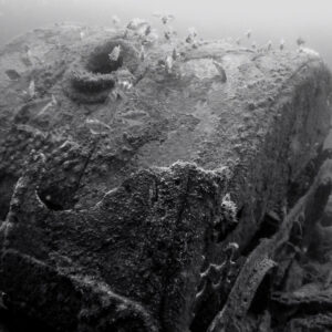 Black and white: close-up of an encrusted wreck boiler, no diver, Ville de Rochefort wreck, Brittany, France