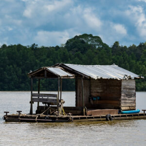Floating wooden fishing hut with tin roof on a bamboo raft, Maratua, Kalimantan (Borneo), Indonesia