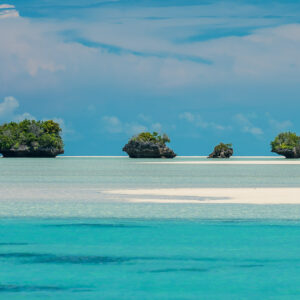 Undercut mushroom-shaped rock islets and sandbank on a turquoise lagoon, Maratua, Kalimantan (Borneo), Indonesia