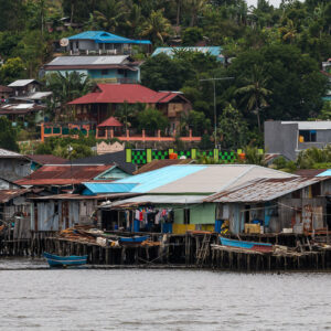 Hillside waterfront district with wooden houses on stilts, Misool, Raja Ampat, Indonesia