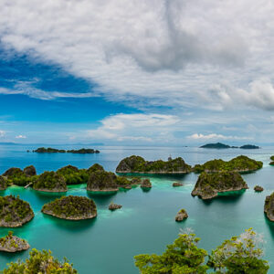 Wide panorama of countless islets in a turquoise lagoon, Waigeo, Raja Ampat, Indonesia