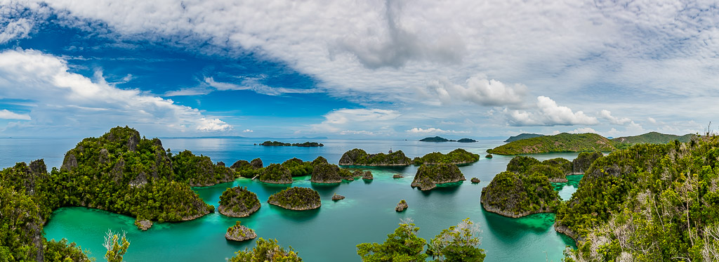Wide panorama of countless islets in a turquoise lagoon, Waigeo, Raja Ampat, Indonesia