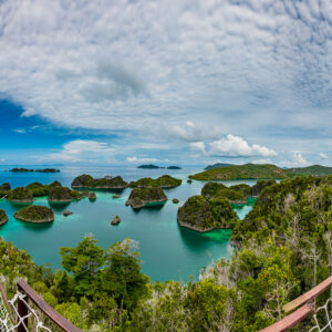 Wooden viewing platform overlooking an islet-studded lagoon, Waigeo, Raja Ampat, Indonesia