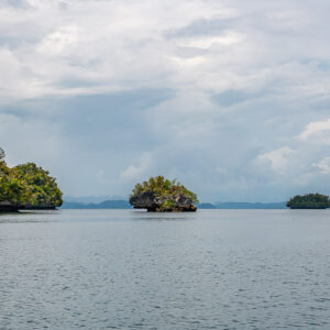 Small islets scattered across a wide grey lagoon, Waigeo, Raja Ampat, Indonesia
