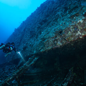 Rebreather diver following the keel of the Levanzo wreck, Red Sea, Egypt
