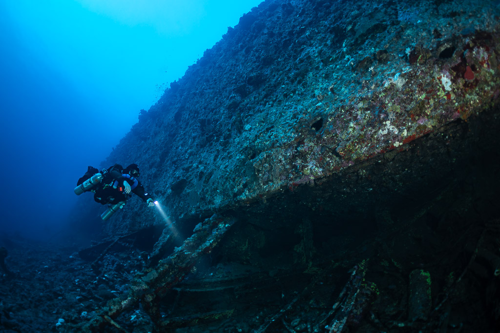 Rebreather diver following the keel of the Levanzo wreck, Red Sea, Egypt