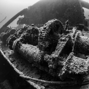 Black-and-white close view of an encrusted deck winch on a wreck, Thistlegorm wreck, Red Sea, Egypt