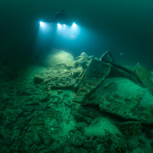 Photogrammetry lights over a broad mound of wreck debris, Saint-Malo, Brittany, France