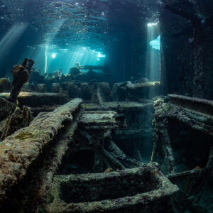 Wreck interior with tangled beams and light shafts from the broken deck, SS Sapona wreck, Bimini, Bahamas