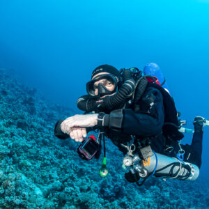 Close frontal view of a rebreather diver with bailout cylinder, Safaga, Red Sea, Egypt