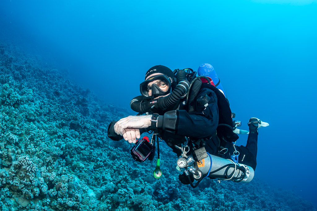 Close frontal view of a rebreather diver with bailout cylinder, Safaga, Red Sea, Egypt