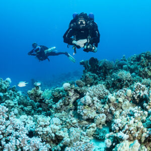 Rebreather diver facing the camera with a second diver behind, Safaga, Red Sea, Egypt